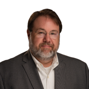 Professional headshot for Alfie Meek, PhD